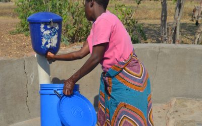 Evidence Action promotes safe water usage through chlorine dispensers